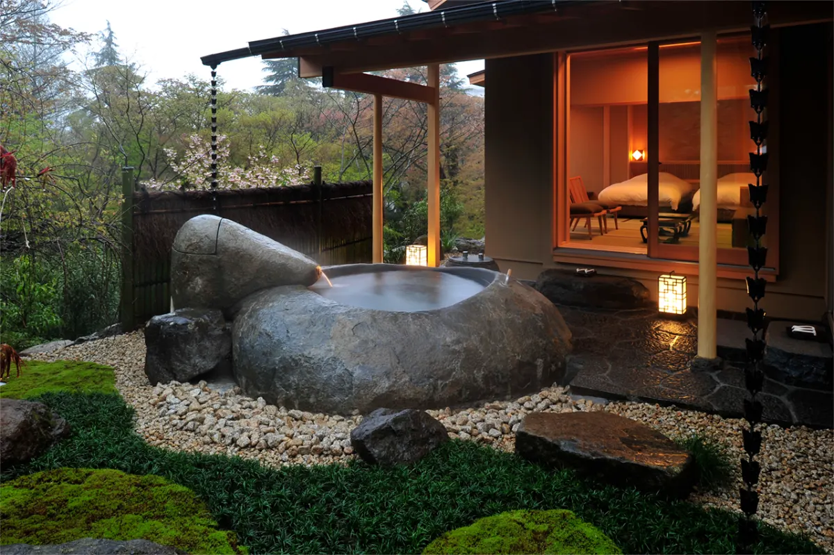 Gora Kadan Hakone private stone onsen bath in suite garden — best onsen ryokan Japan