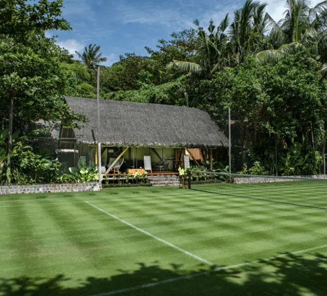 The grass lawn tennis court at Bawah Reserve in the Anambas Islands, Indonesia