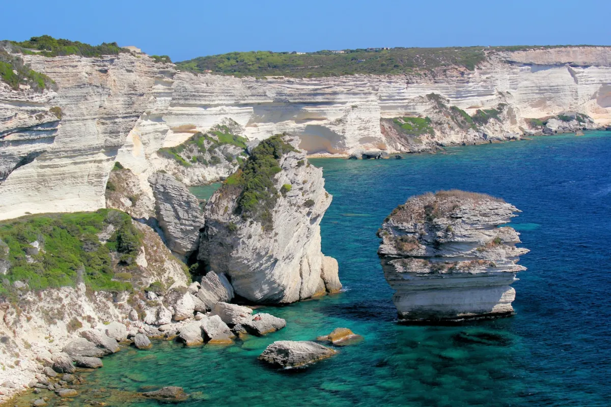 Chalk cliffs at Bonifacio, Corsica, a key anchorage on a Sardinia and Corsica yacht charter route