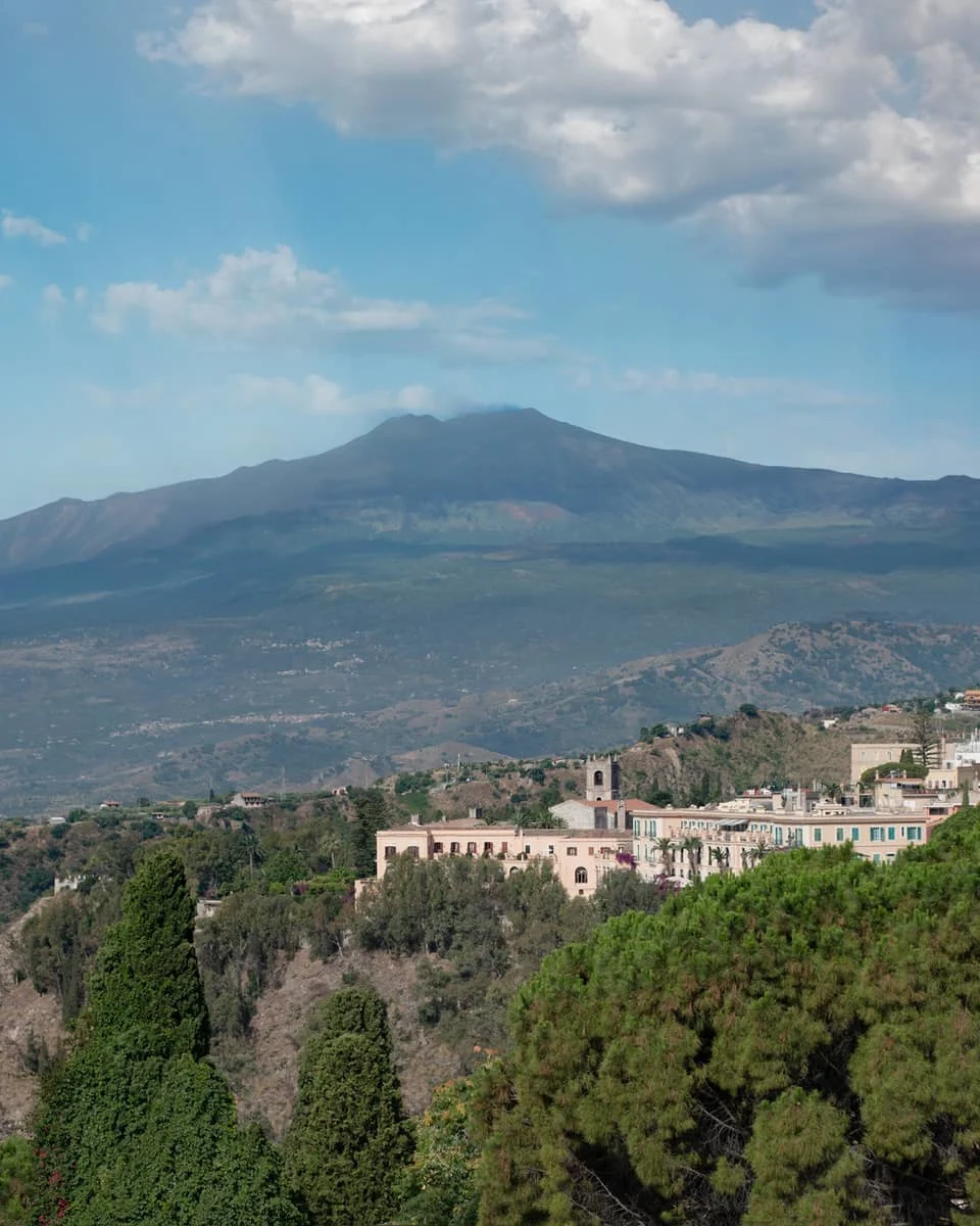 Mount Etna volcano rising above Taormina, Sicily, seen from the hills