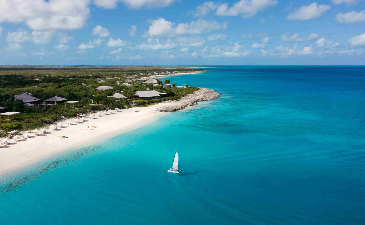 Amanyara Turks and Caicos beach aerial with sailboat, Northwest Point Marine National Park