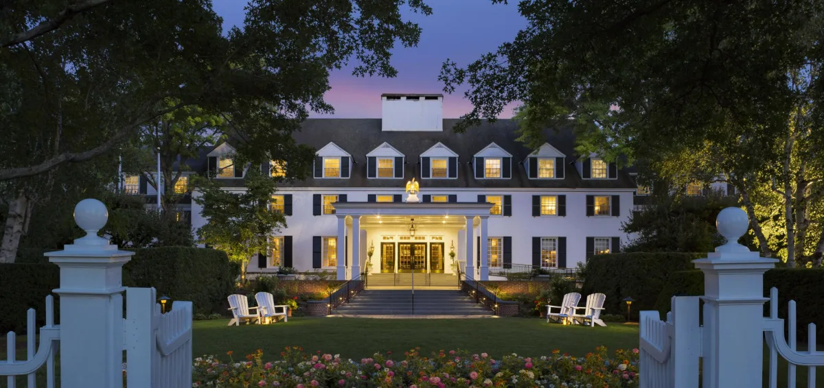 Woodstock Inn and Resort on the village green in Woodstock, Vermont, at dusk in fall
