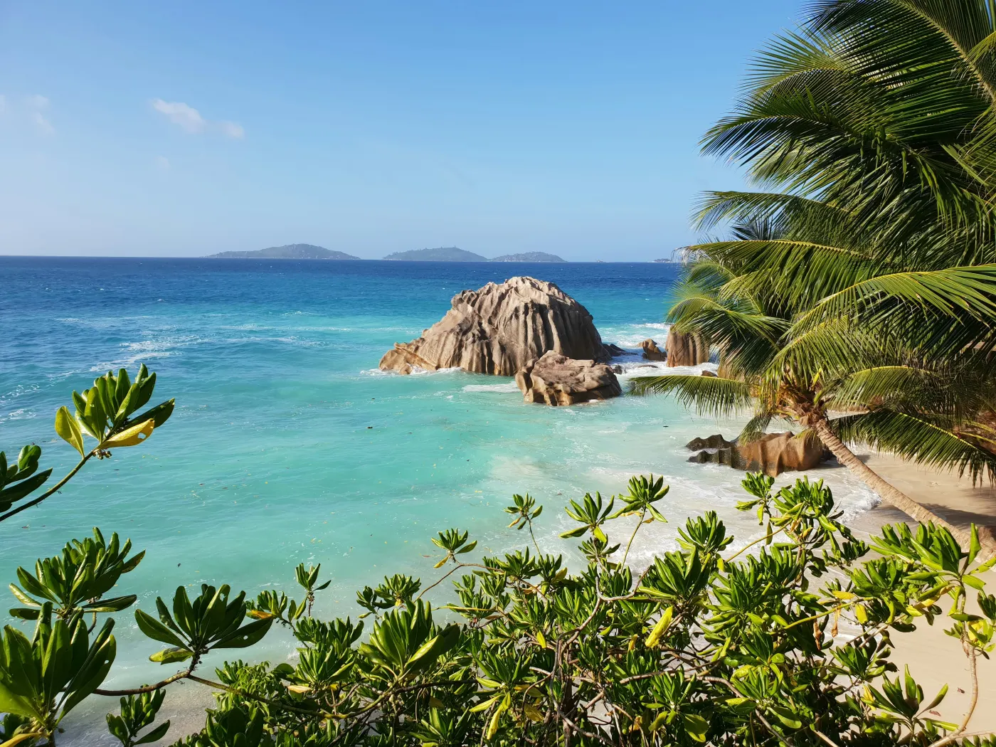 Turquoise Indian Ocean coastline with luxury resort at Seychelles or Mauritius 2026
