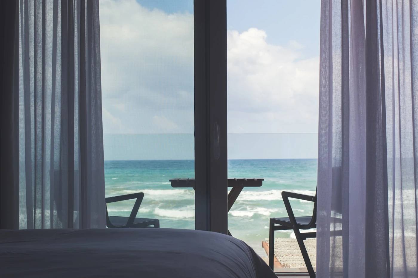 Ocean-view hotel room with a balcony, the payoff of a well-timed suite upgrade