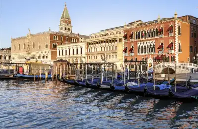 Gondolas on the lagoon by Hotel Danieli in Venice