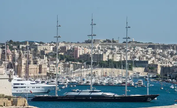 A three-masted sailing superyacht in the Mediterranean, the style of vessel used for the Cookson Odyssey voyage