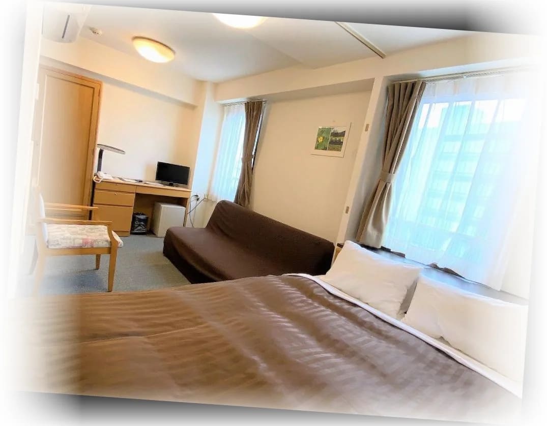 사쿠라_호텔_하타가야_디럭스_더블_-_침대