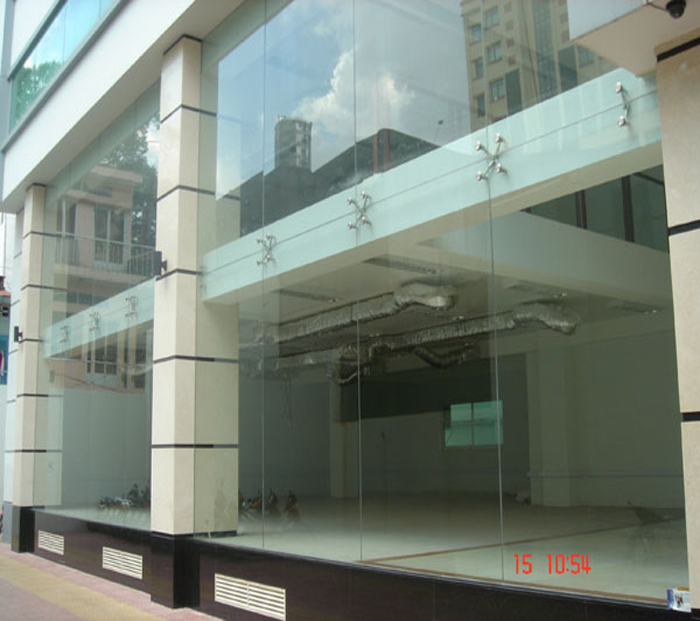 Các mẫu nhà mặt tiền bằng kính cường lực đẹp - Trang trí mặt tiền bằng kính cường lực