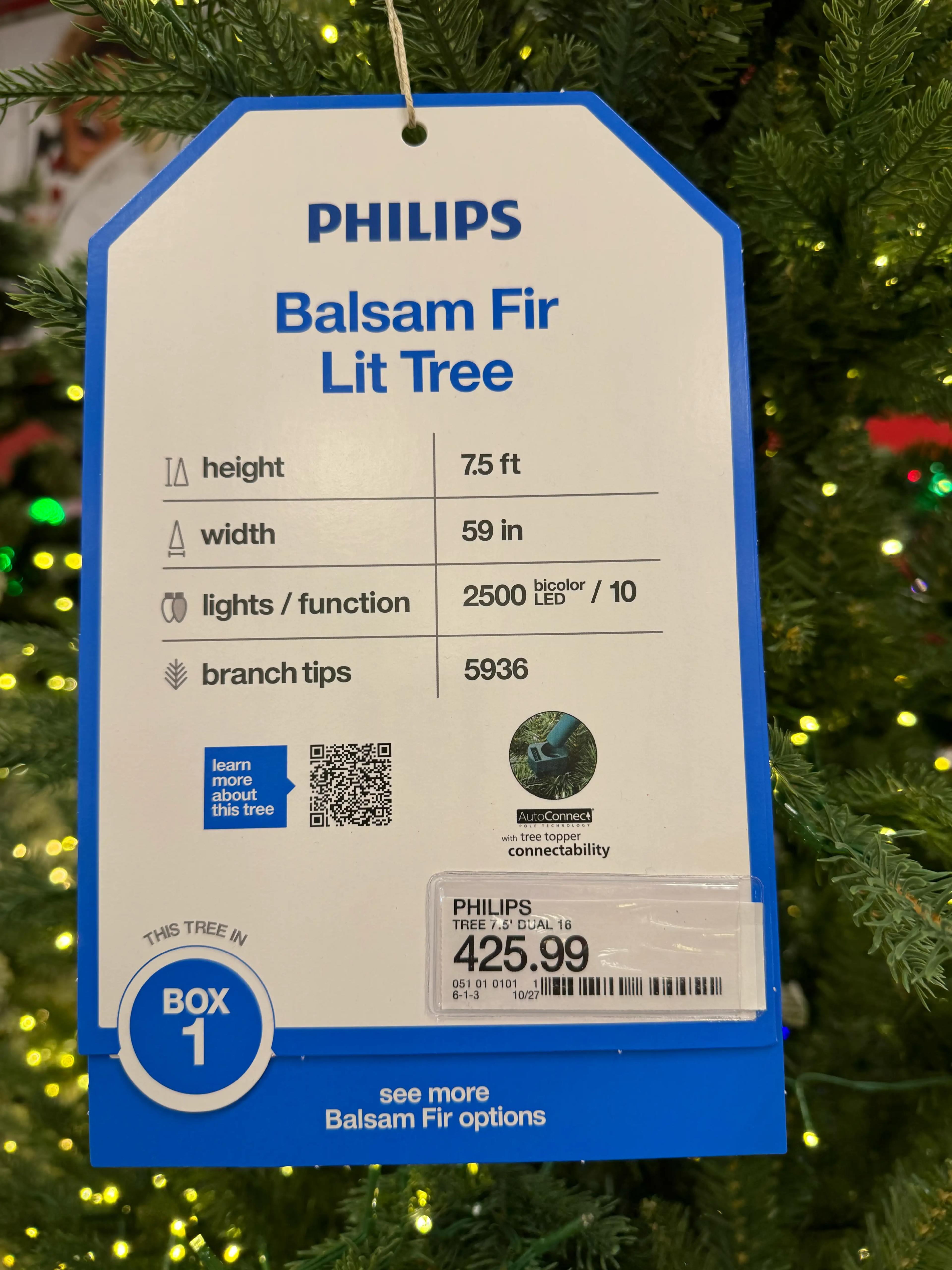 Product tag showing 7.5ft Balsam Fir specifications: 59in width, 2500 bicolor LEDs, 5936 branch tips, $425.99
