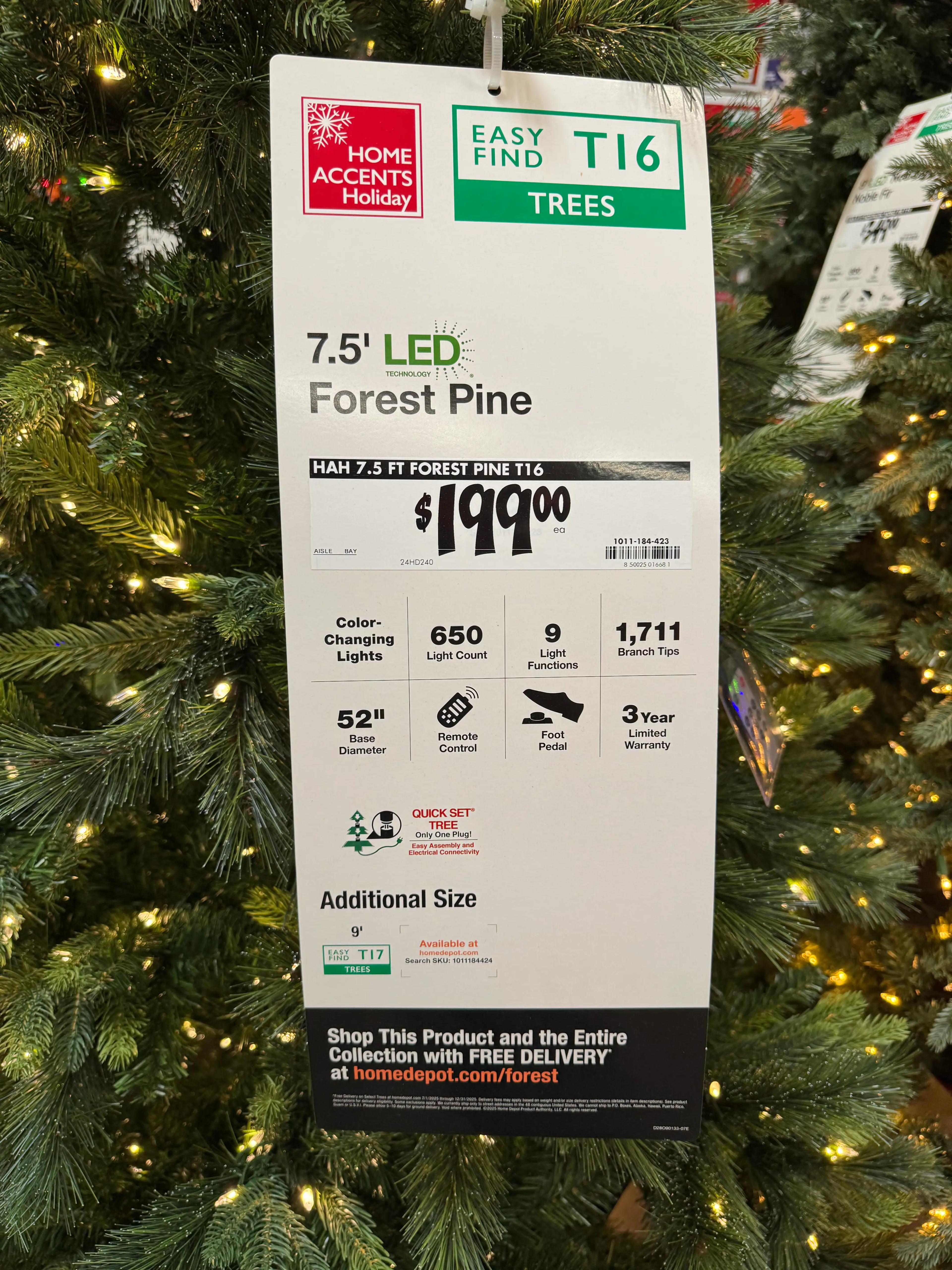 Product tag showing 7.5ft Forest Pine specs: $199, 650 color-changing LEDs, 1,711 tips, remote control, 52in base