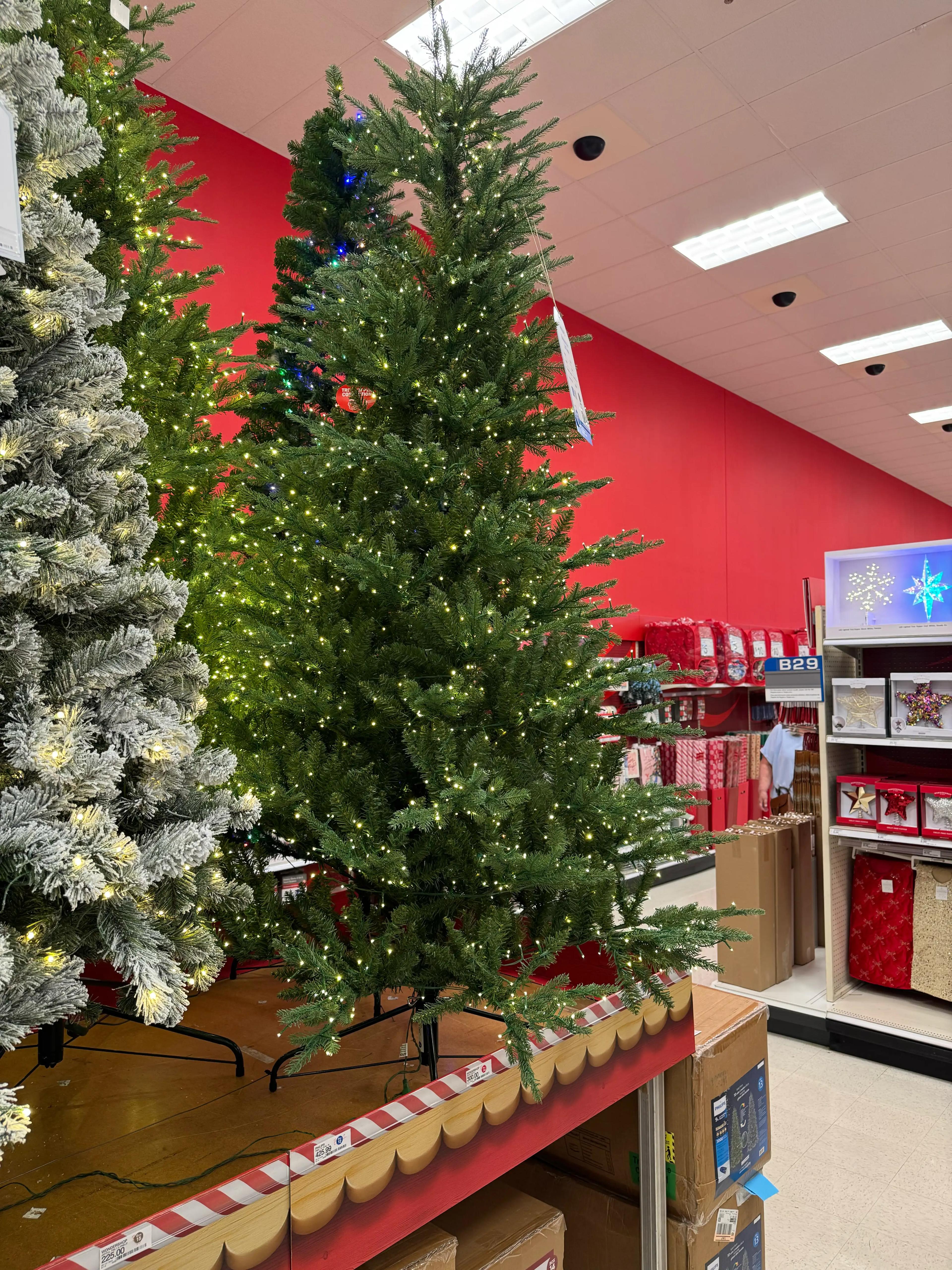 Dense fir-style tree with PVC needles, warm white micro LEDs throughout, full shape with minimal gaps