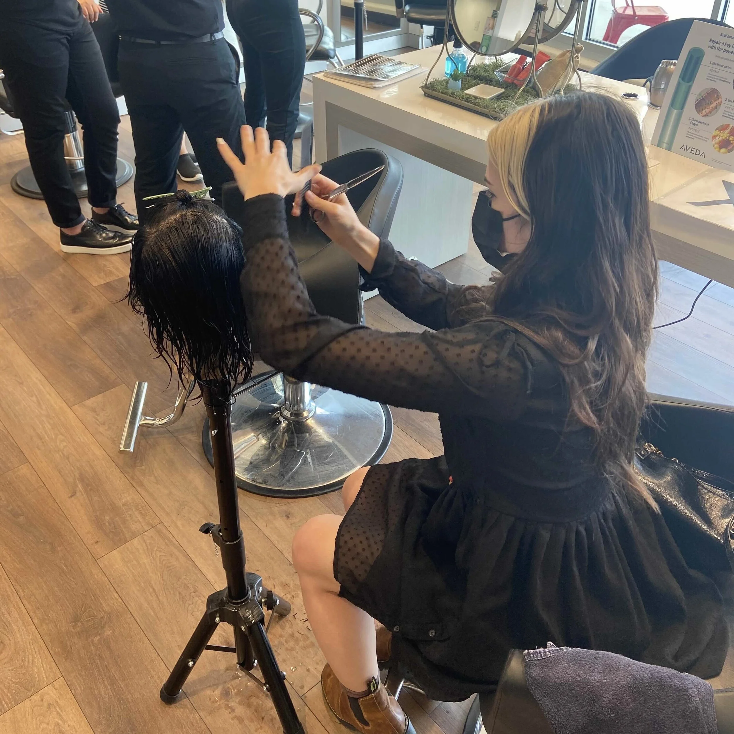 Maximum FX stylists working with clients at the salon