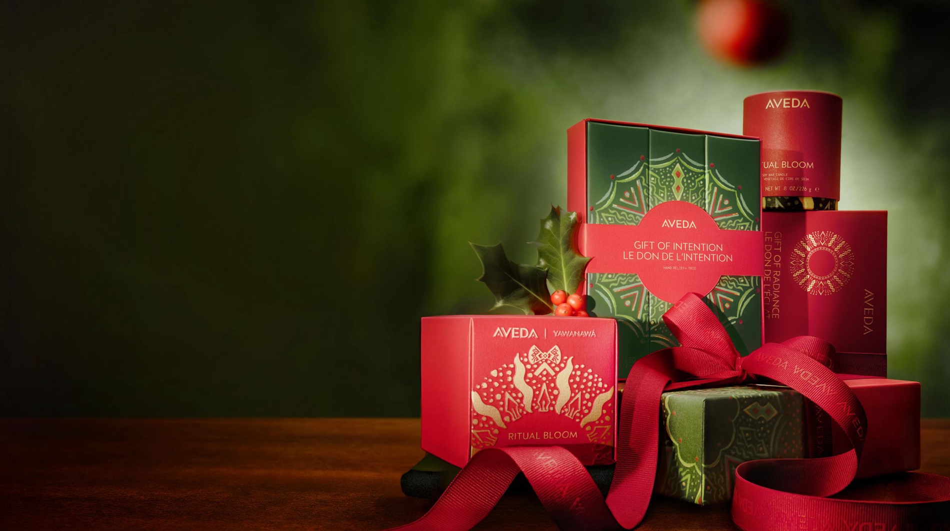 Aveda holiday gift sets wrapped with ribbon