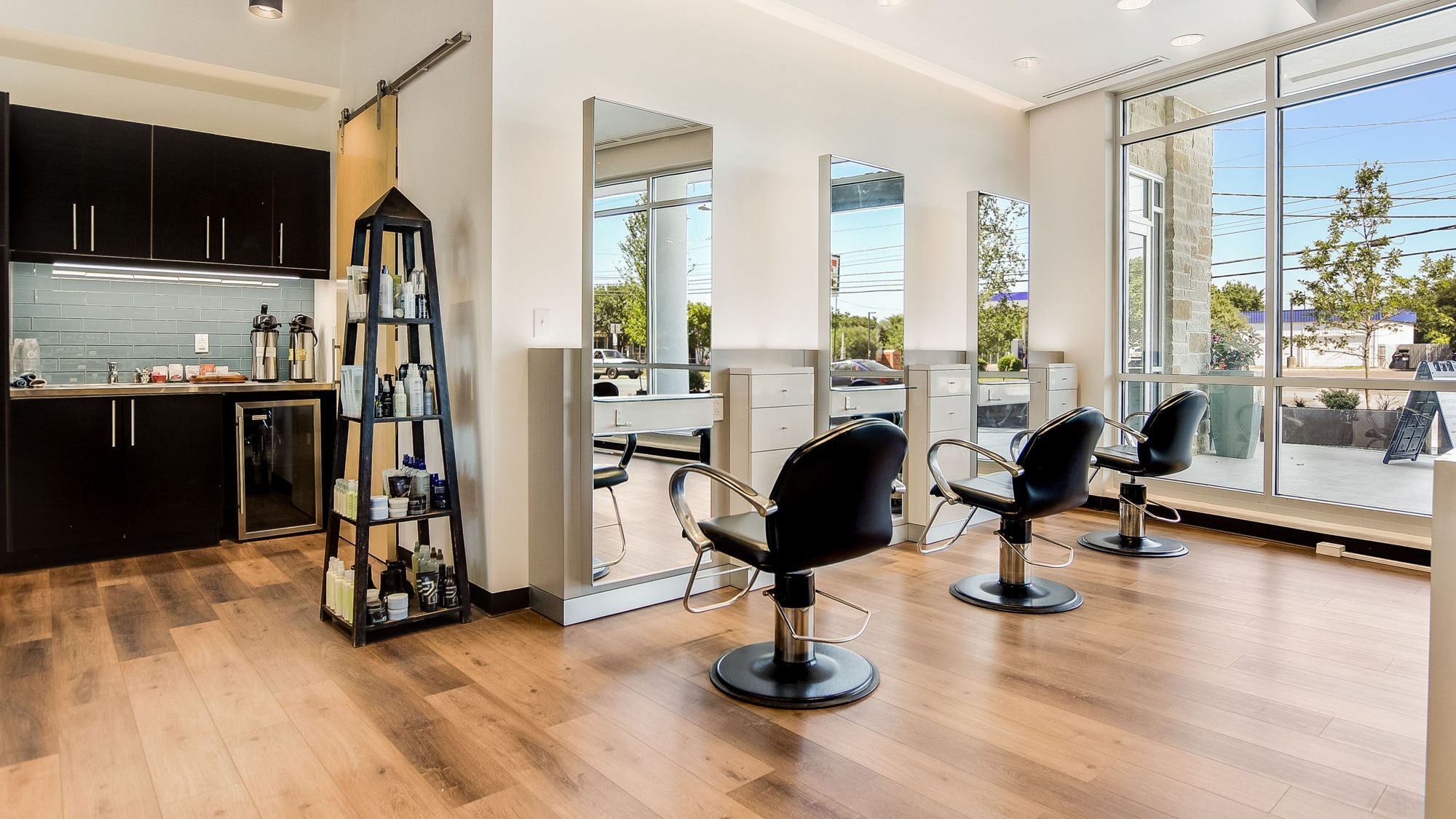 Styling stations and the front windows at South Lamar