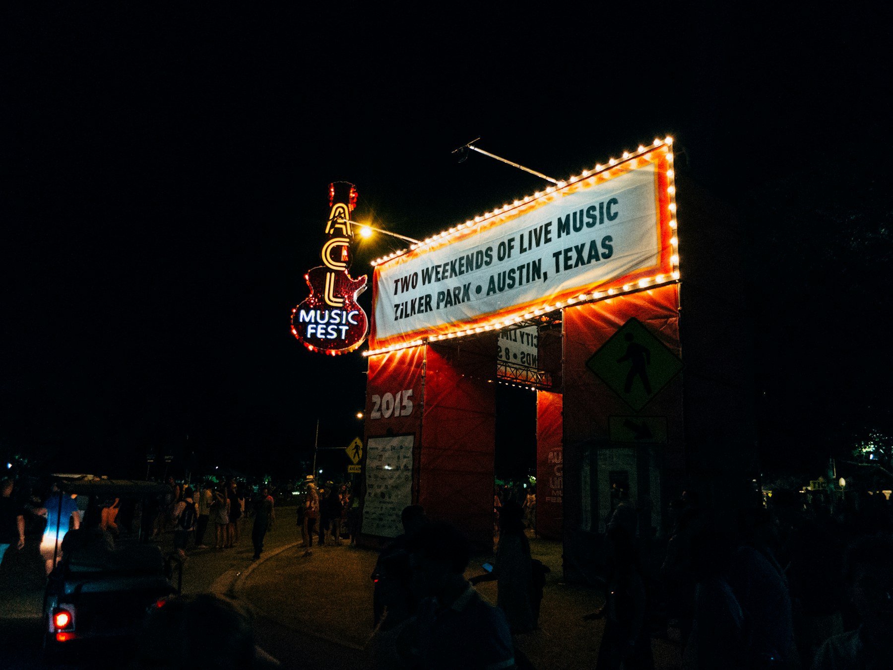 The lit ACL Music Fest entrance sign at Zilker Park, Austin, Texas