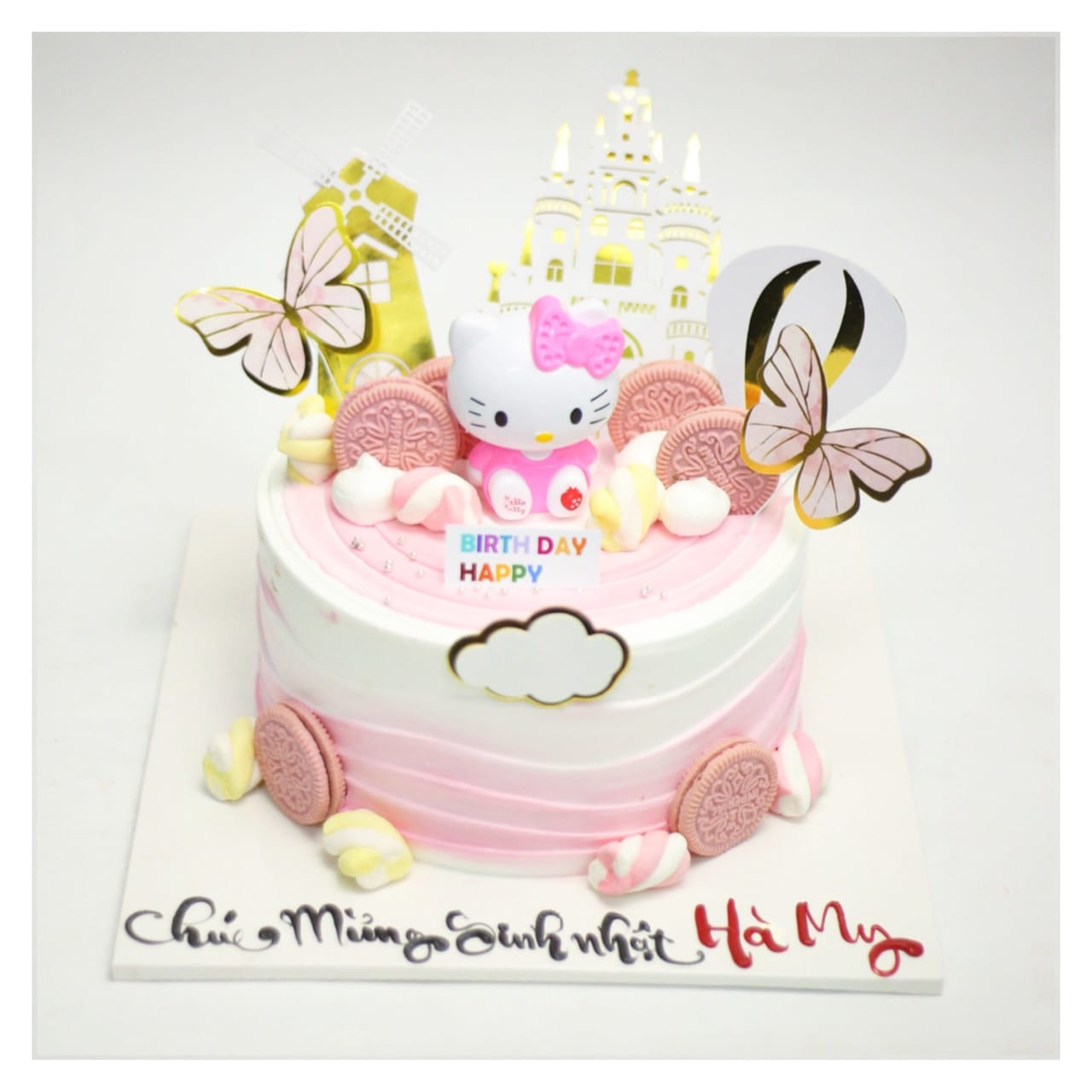 Bánh kem Hello Kitty màu hồng họa tiết lâu đài
