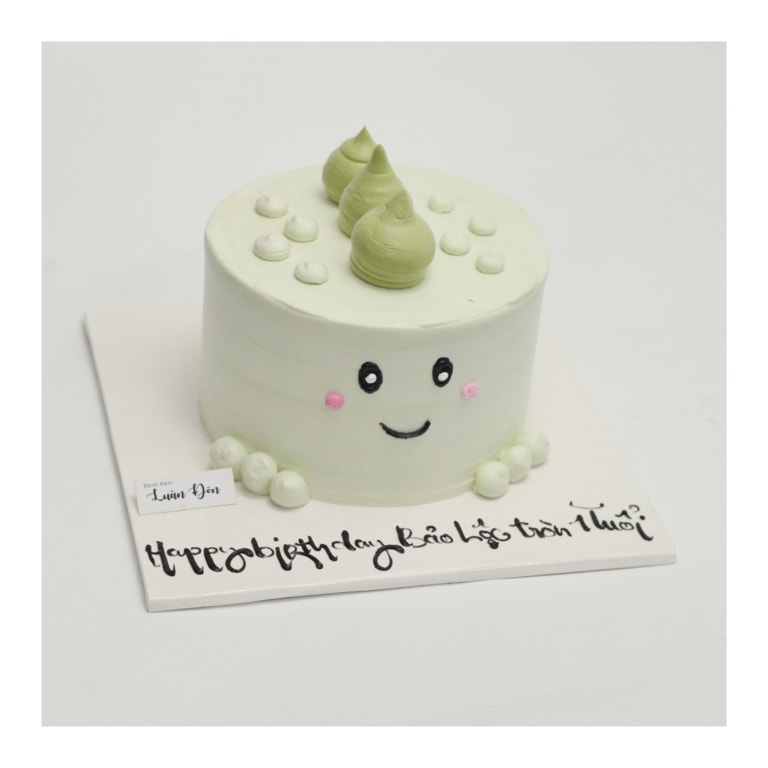 Bánh kem xanh pastel mặt cười đơn giản