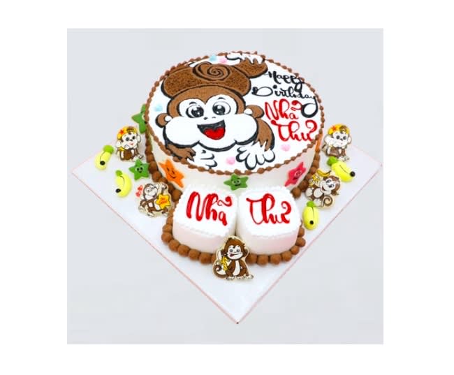 Bánh kem chú khỉ nâu trên nền trắng