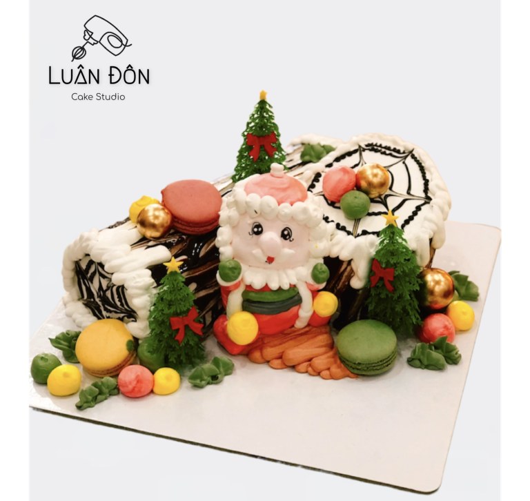 Bánh kem khúc cây Noel ông già tuyết