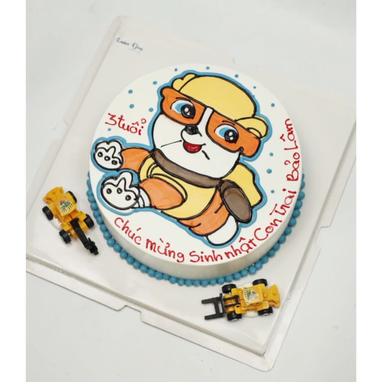 Bánh kem máy xúc cho bé trai yêu xe cộ