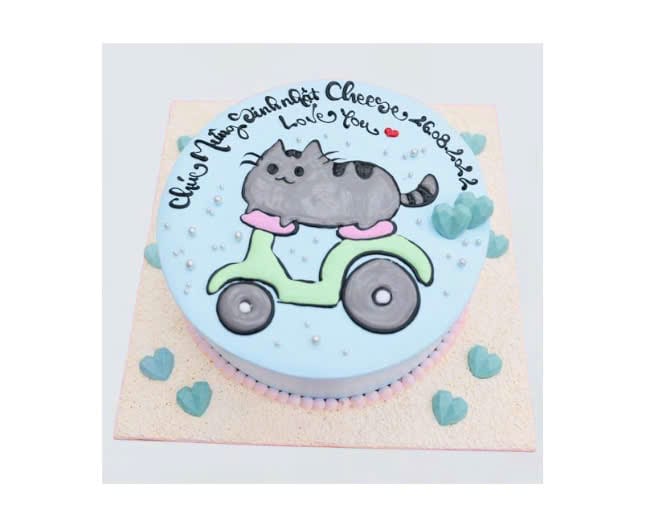 Bánh kem mèo Pusheen cưỡi xe máy màu xanh