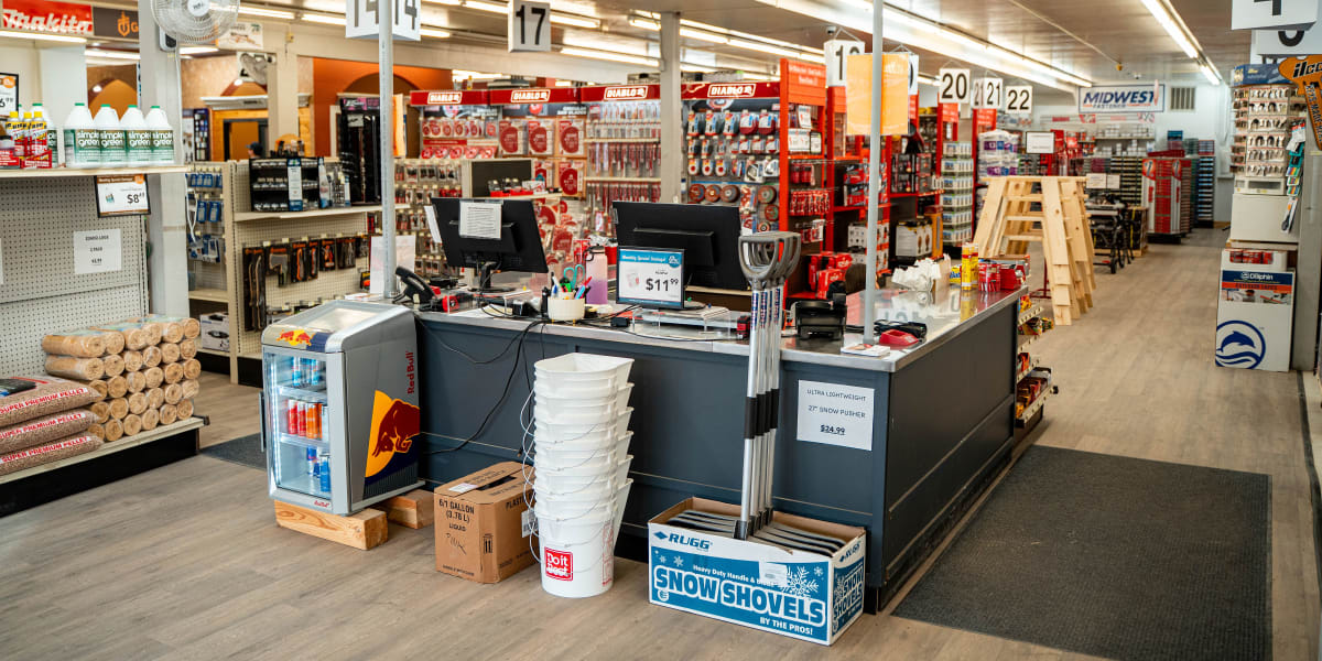 Interior view of a Western Building Center store showing the checkout area and main retail floor