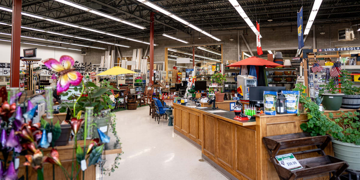 Interior view of Western Building Center's Whitefish store showing the central service counter area with wood cabinetry and d