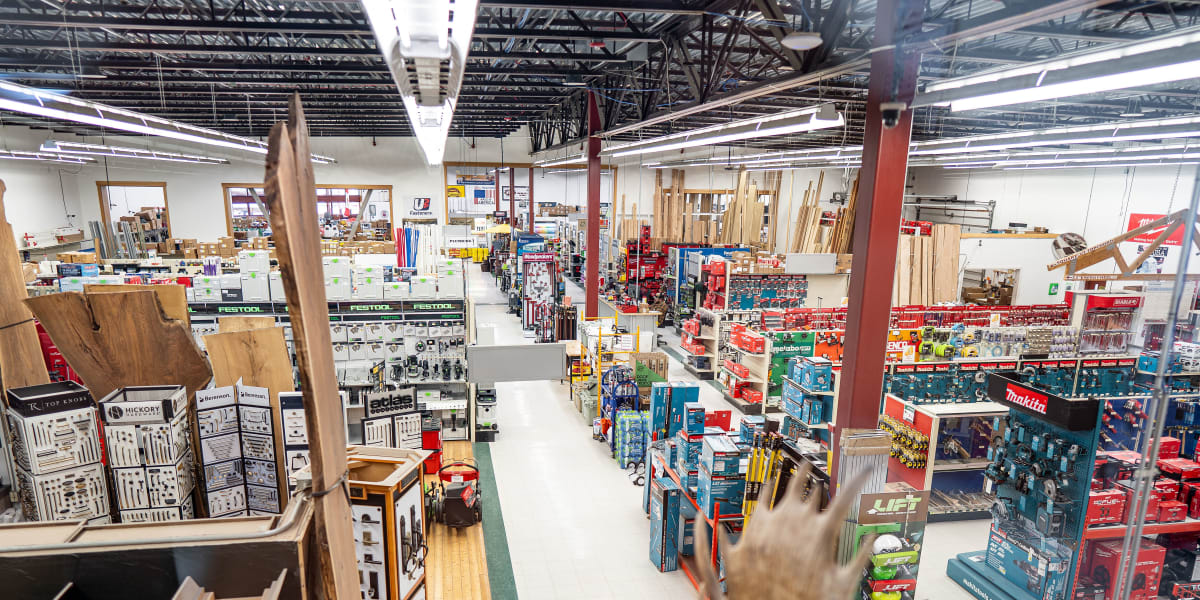 Interior view of a Western Building Center store showing multiple departments and aisles from an elevated perspective