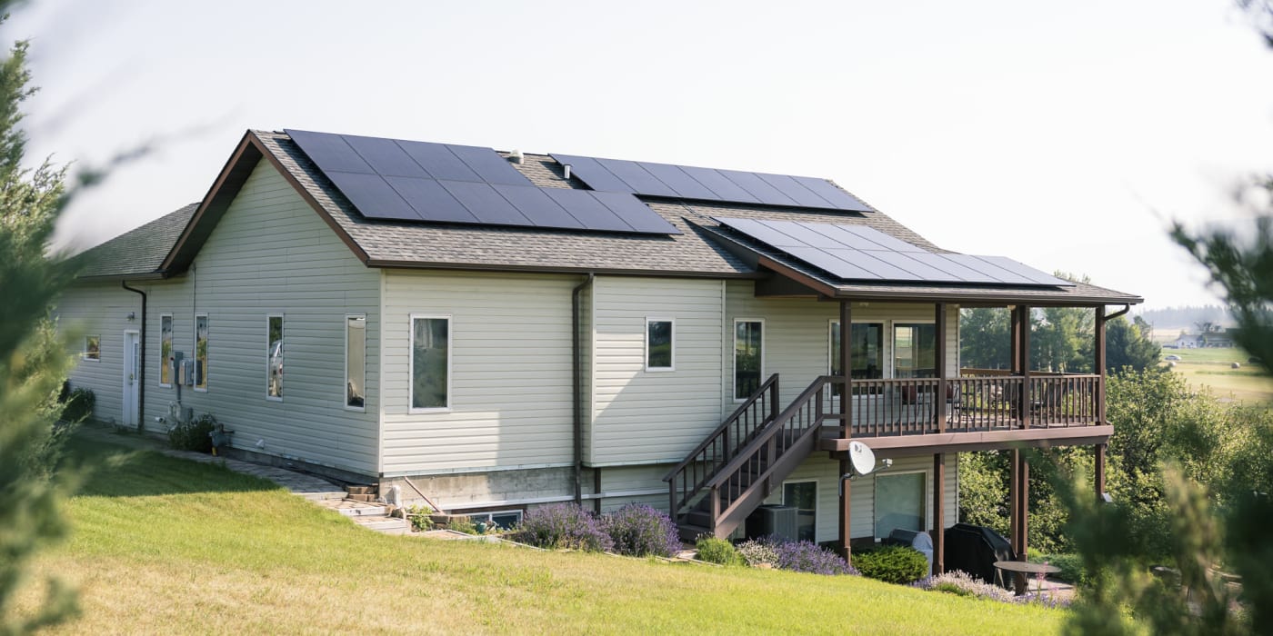 Montana ranch home with rooftop solar and a lavender yard