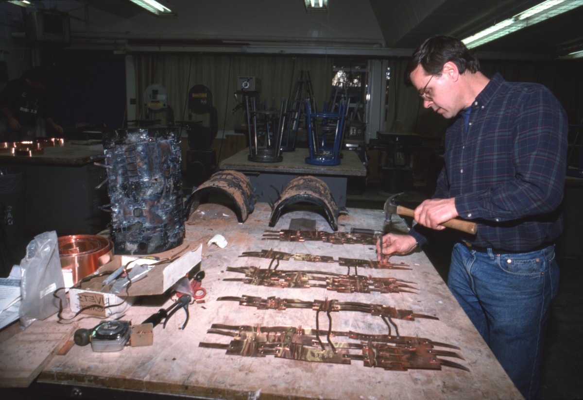 Preparing the sand mold for casting