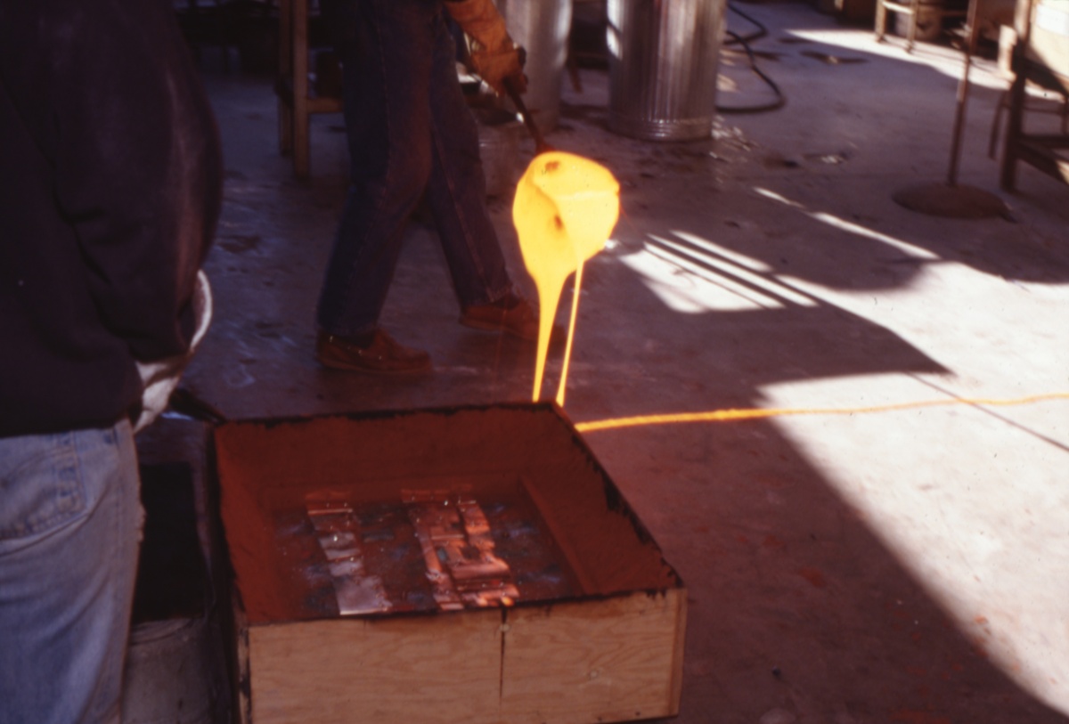 Gathering molten glass from the furnace