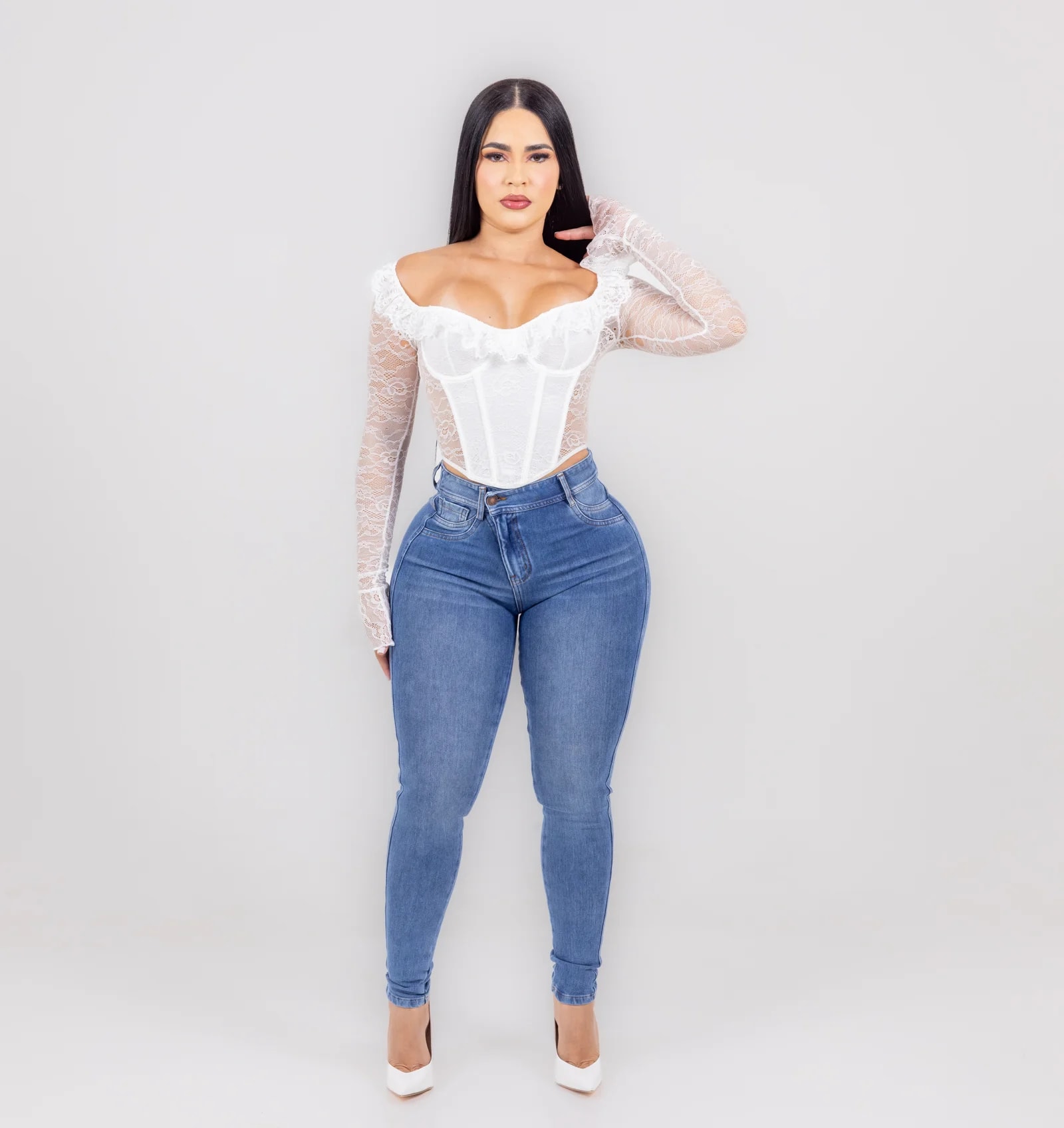 Same outfit, side profile showing the skinny-jean fit