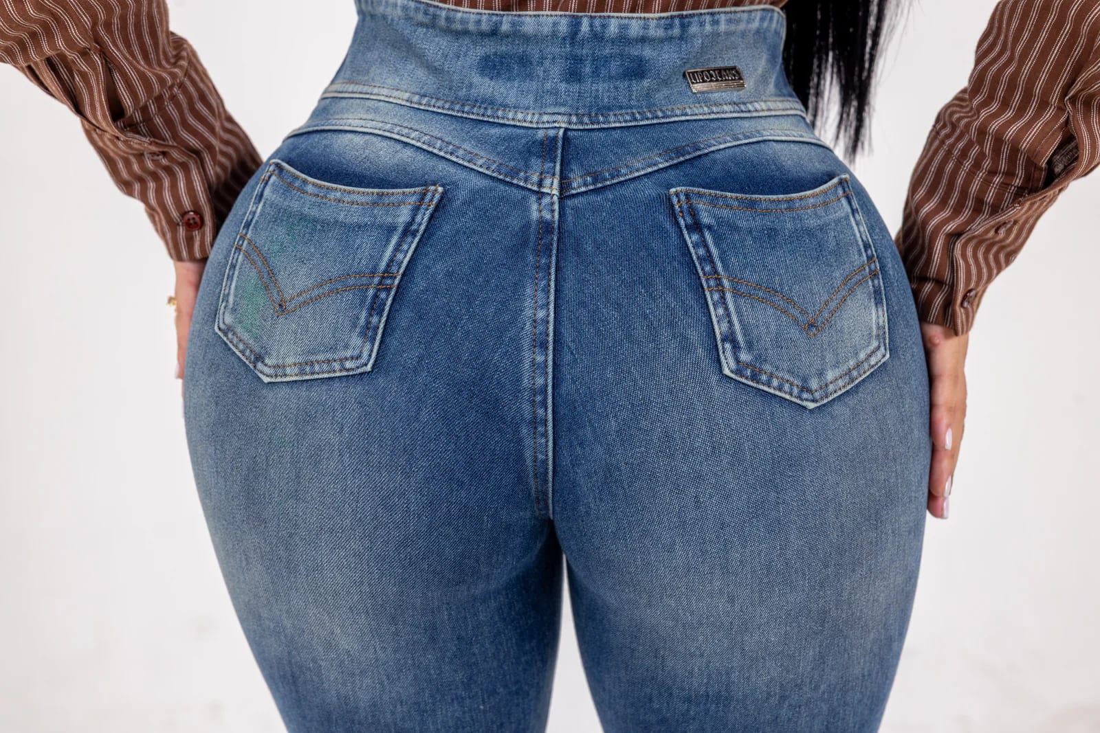 Detail of the back pockets and Y-seam on the flared jean