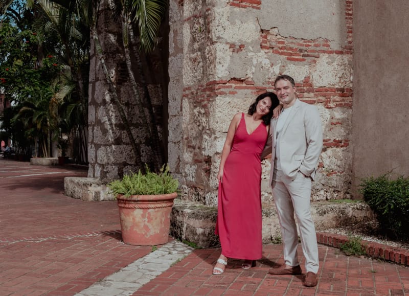 Intimate couple portrait beside colonial walls of Santo Domingo's Colonial City, couple photography with natural light