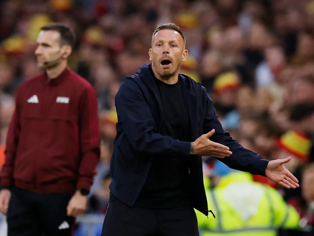 Asisten pelatih Wales Piet Cremers memberi komentar setelah pertandingan