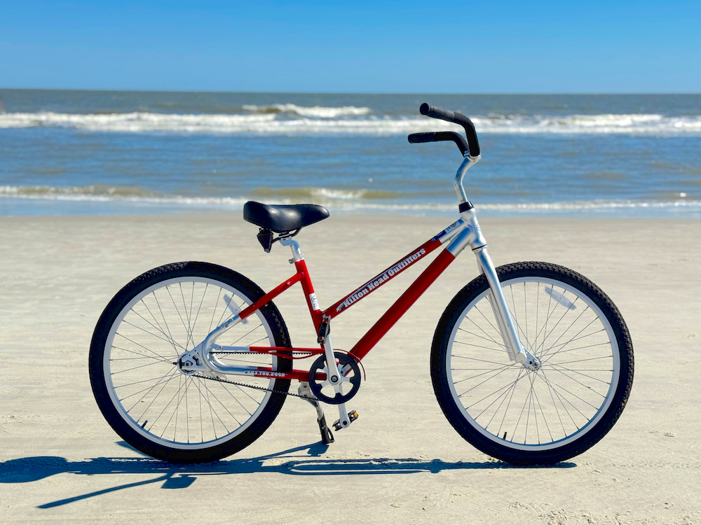 Red Youth Beach Cruiser Bike on Beach