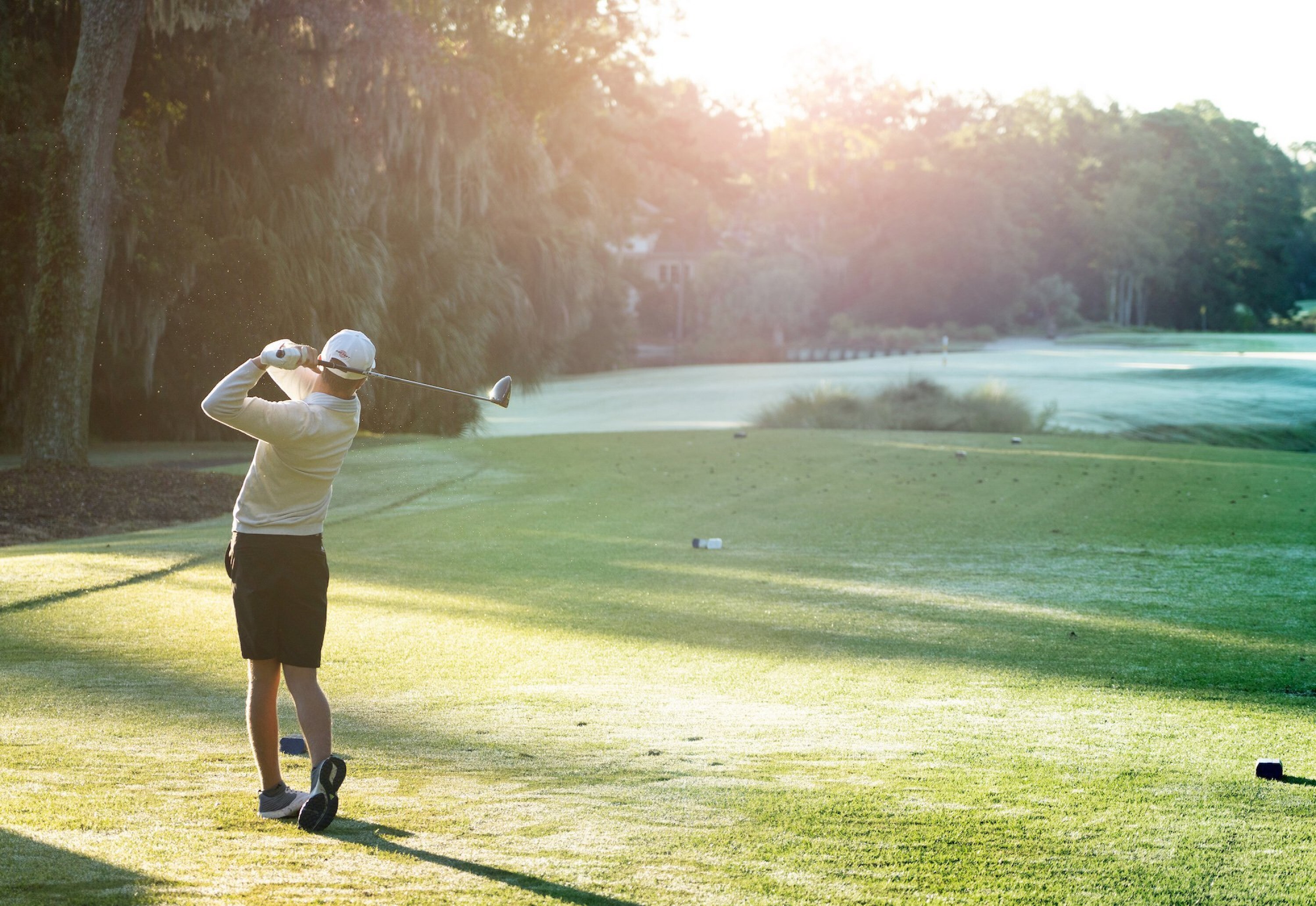 Golfer teeing off at Arthur Hills Course