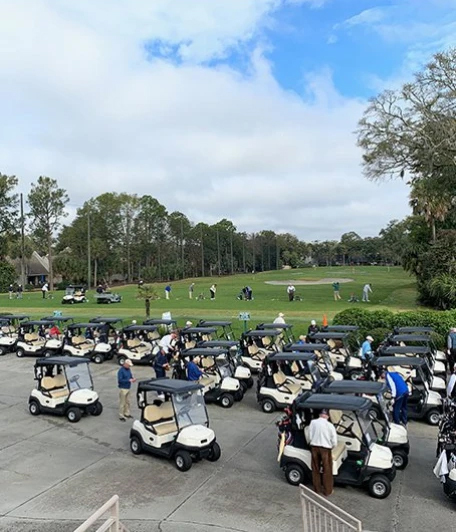 Golf carts gathering at the Jones course