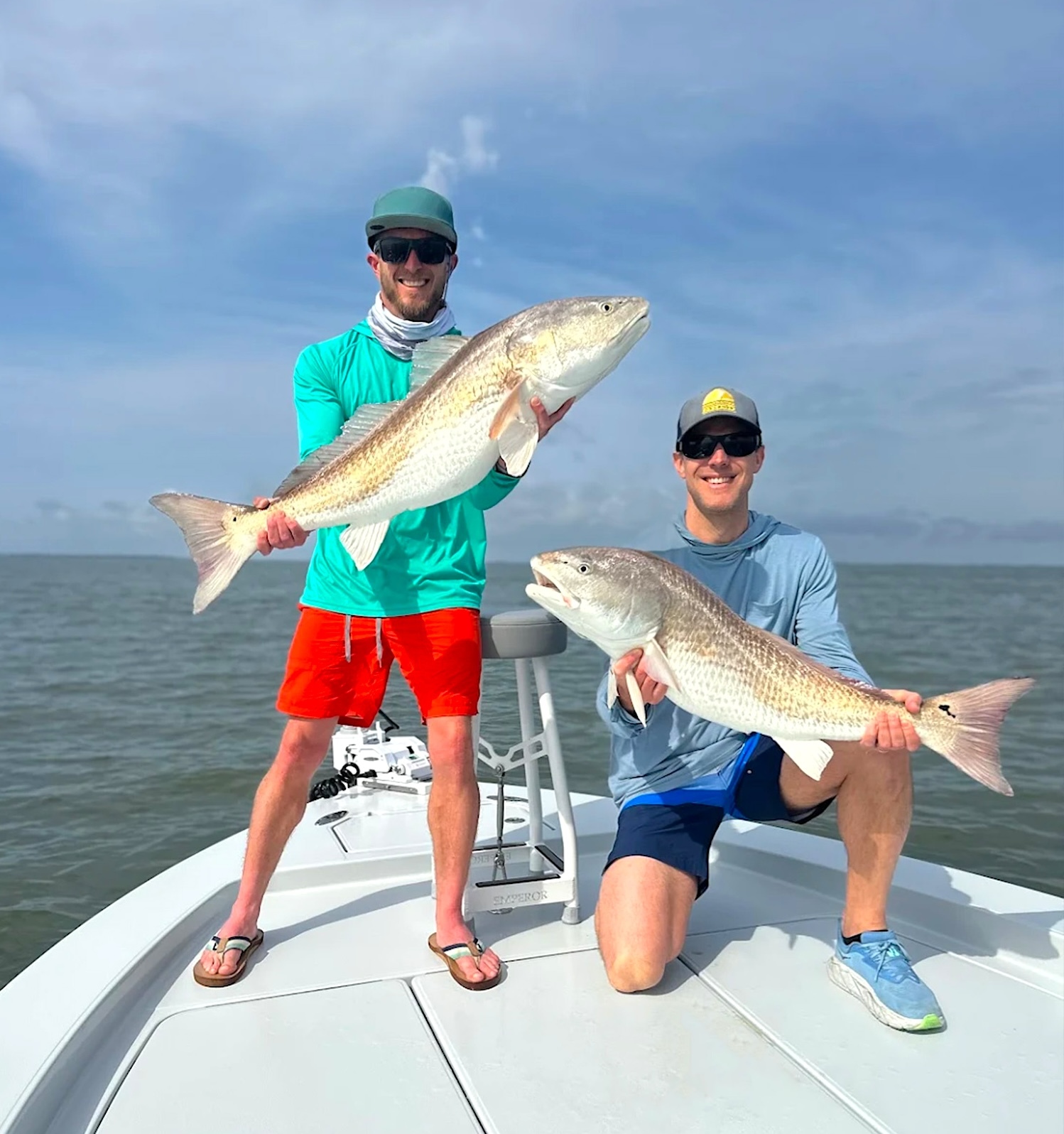 Offshore Fishing Photo Guys Holding Fish