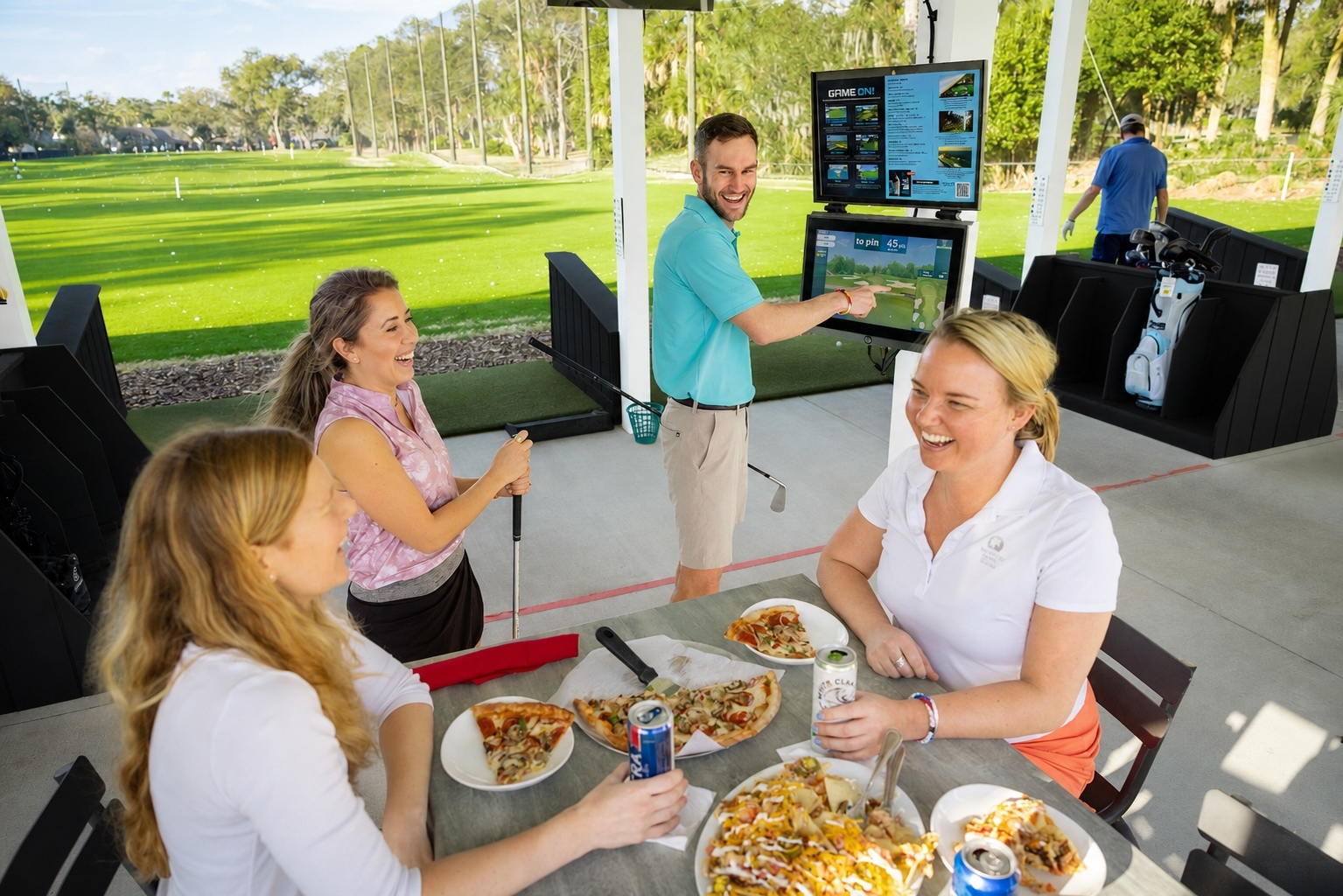 Toptracer Range with guests and food