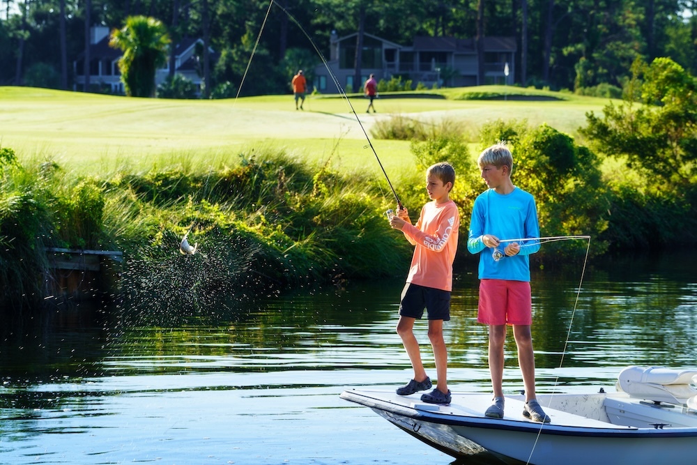 Two Boys Fishing in the Lagoon
