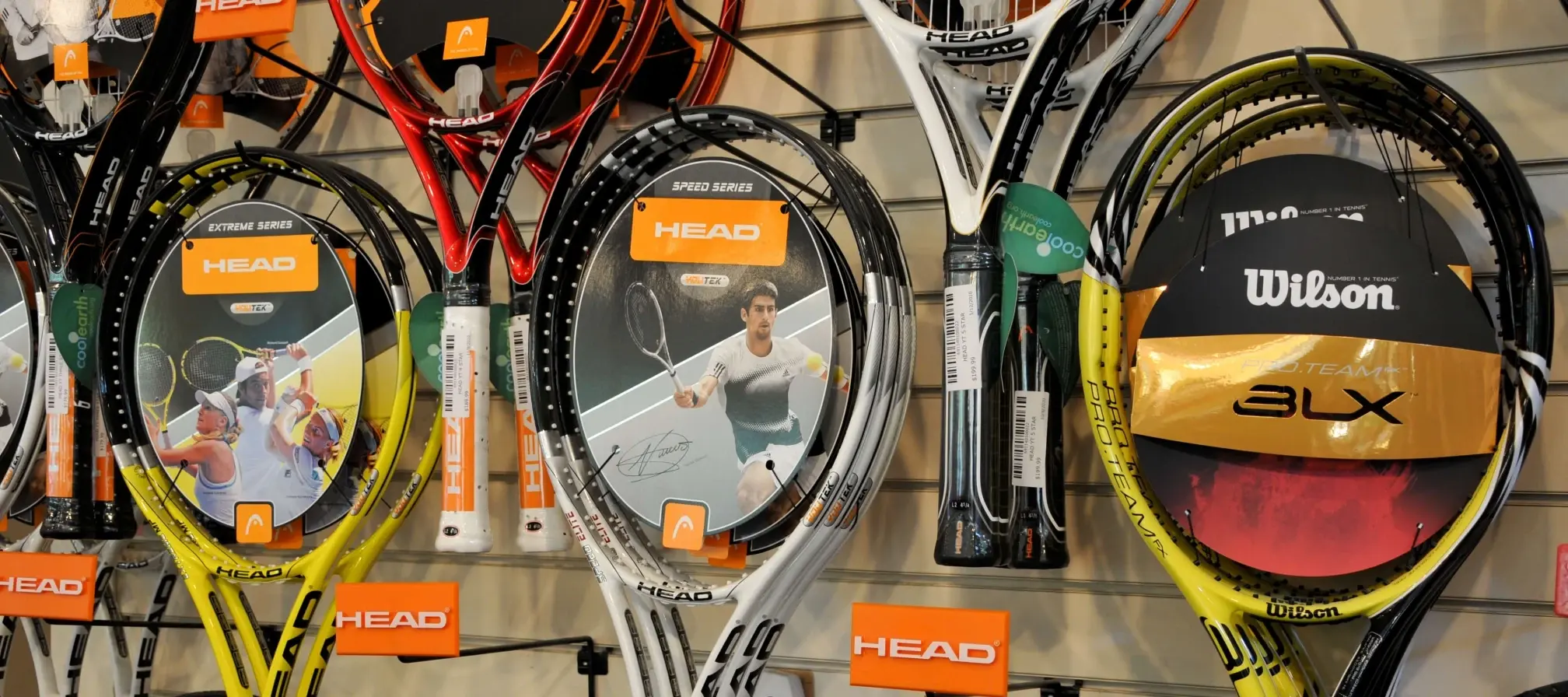 wall of tennis rackets at the Tennis Pro Shop