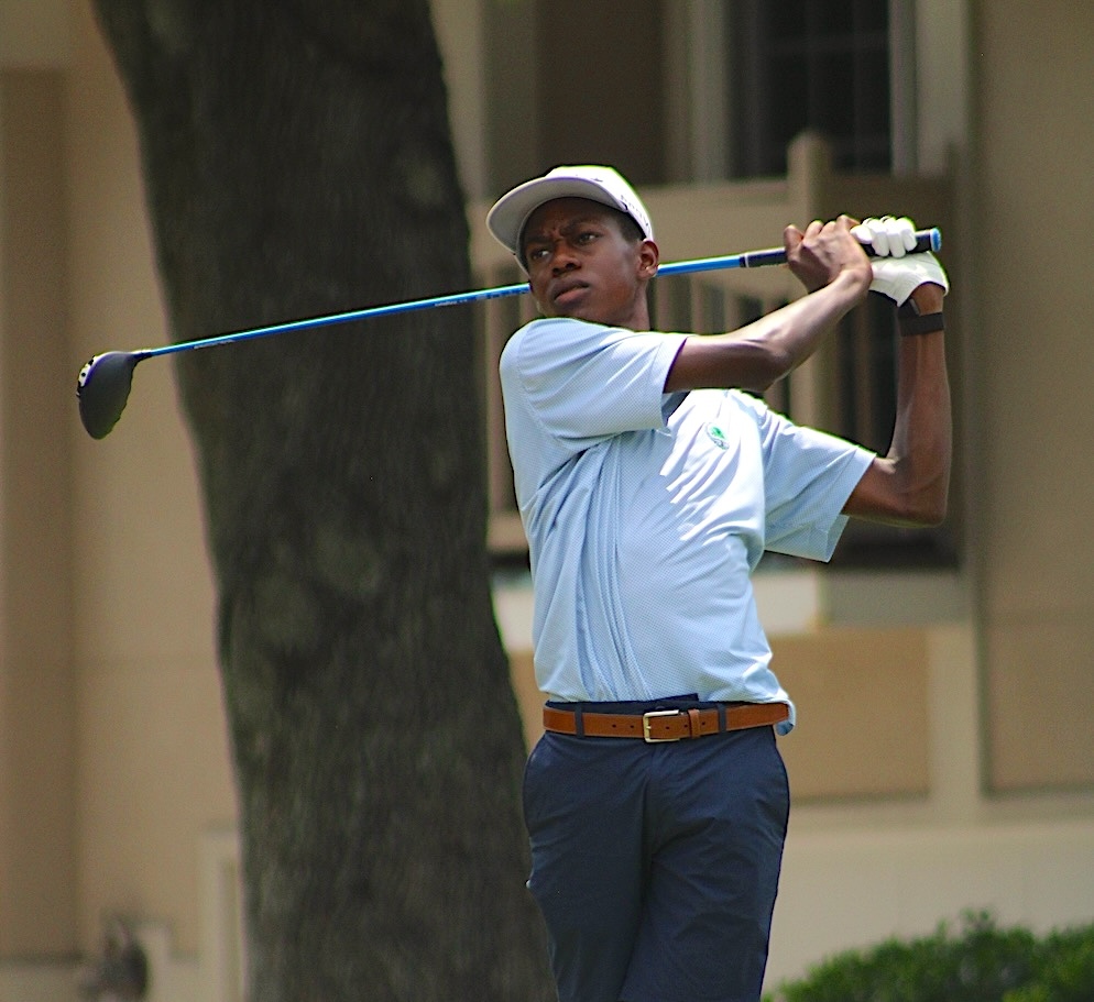 Young Male Golfer Swinging a Golf Club at Arthur Hills