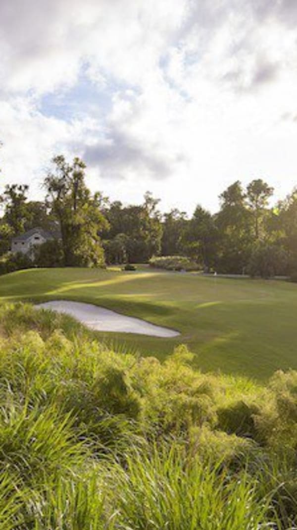 golf course with sunset