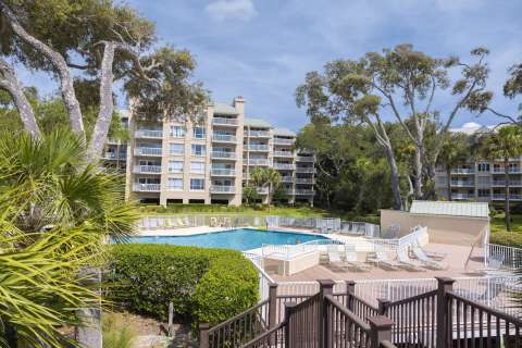 Community pool and buildings at Barrington Arms