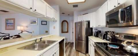 Kitchen in a villa at Barrington Park