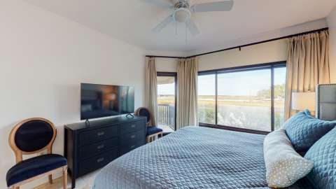 Bedroom in a villa at Captain's Quarters