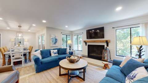 Living room with dining room at Fazio VIllas