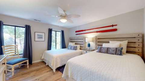 Bedroom with two beds at Fazio VIllas