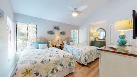 Bedroom with two beds at Fazio VIllas